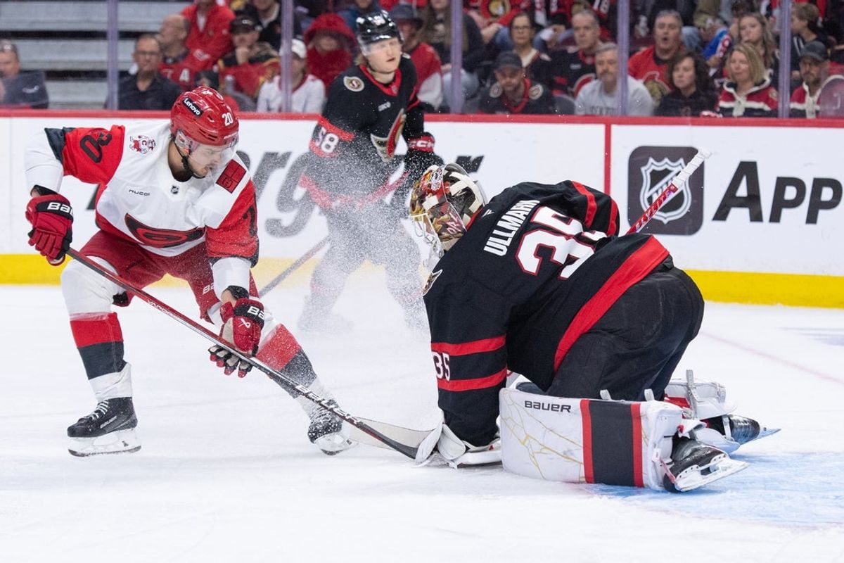 Apr 25, 2026; Ottawa, Ontario, CAN; Ottawa Senators goalie Linus Ullmark (35) makes a save in front of Carolina Hurricanes center Sebastian Aho (20) in the second period of game four of the first round of the 2026 Stanley Cup Playoffs at the Canadian Tire Centre. Mandatory Credit: Marc DesRosiers-Imagn