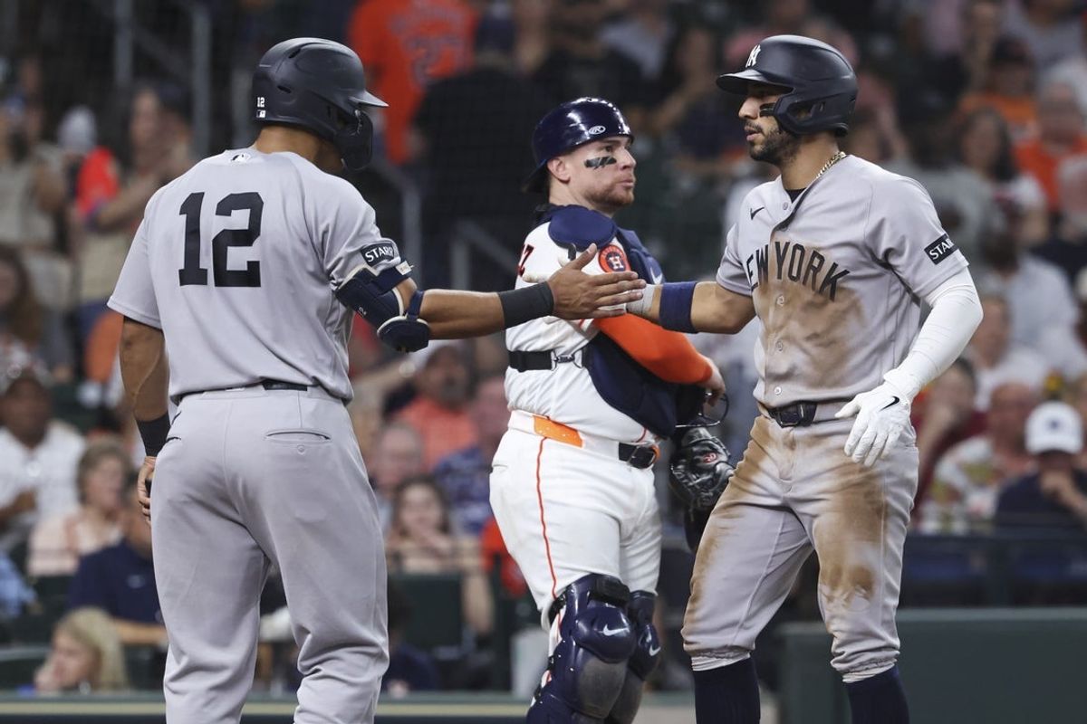Apr 25, 2026; Houston, Texas, USA; New York Yankees shortstop Jose Caballero (72) celebrates with center fielder Trent Grisham (12) after hitting a home run during the fifth inning against the Houston Astros at Daikin Park. Mandatory Credit: Troy Taormina-Imagn Images