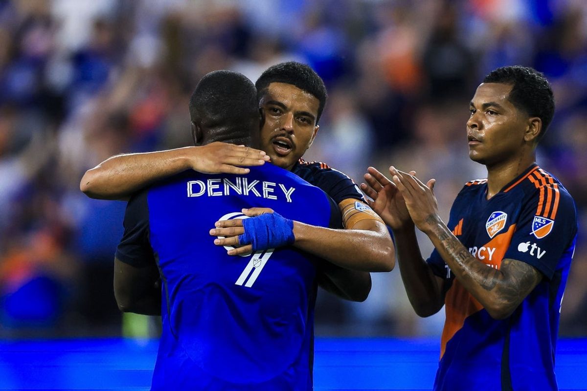 Apr 25, 2026; Cincinnati, Ohio, USA; FC Cincinnati forward Kevin Denkey (9) hugs midfielder Evander (10) after scoring on a penalty kick in the first half against Red Bull New York at TQL Stadium. Mandatory Credit: Katie Stratman-Imagn Images