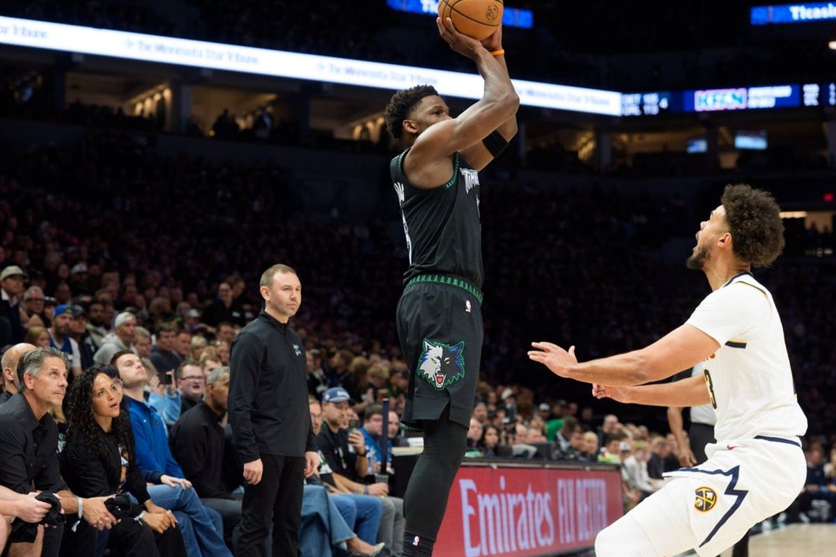 Apr 25, 2026; Minneapolis, Minnesota, USA; Minnesota Timberwolves guard Anthony Edwards (5) shoots over Denver Nuggets forward Cam Johnson (23) in the first quarter at Target Center. Mandatory Credit: Matt Blewett-Imagn Images