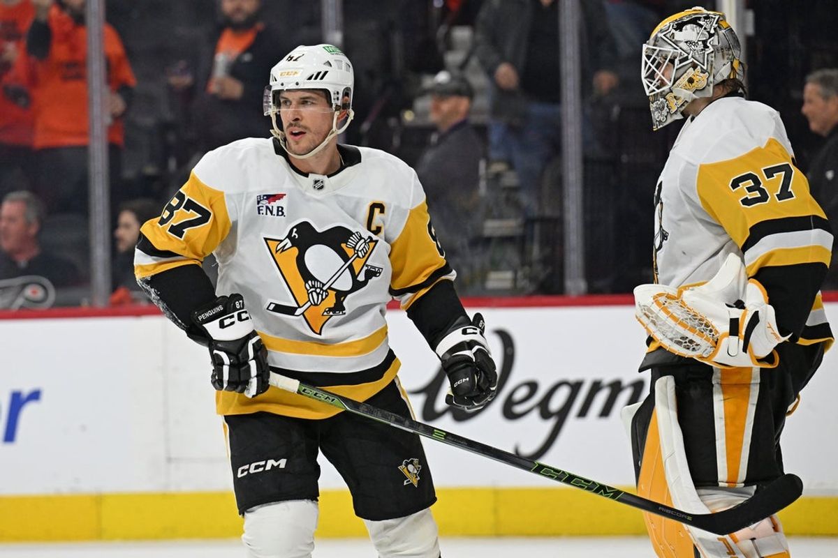 Apr 25, 2026; Philadelphia, Pennsylvania, USA; Pittsburgh Penguins center Sidney Crosby (87) and goaltender Arturs Silovs (37) celebrate win against the Philadelphia Flyers during the third period in game four of the first round of the 2026 Stanley Cup Playoffs at Xfinity Mobile Arena. Mandatory Credit: Eric Hartline-Imagn Images