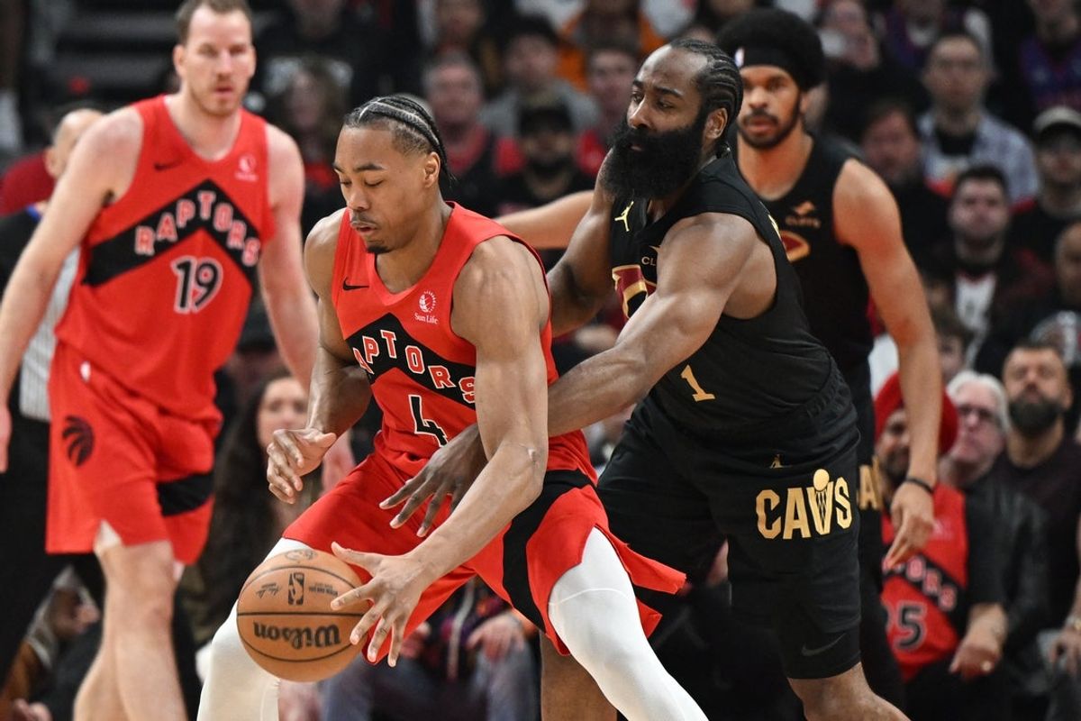 Apr 26, 2026; Toronto, Ontario, CAN;   Cleveland Cavaliers guard James Harden (1) tries to steal the ball from Toronto Raptors forward Scottie Barnes (4) during game four of the first round of the 2026 NBA Playoffs at Scotiabank Arena. Mandatory Credit: Dan Hamilton-Imagn Images