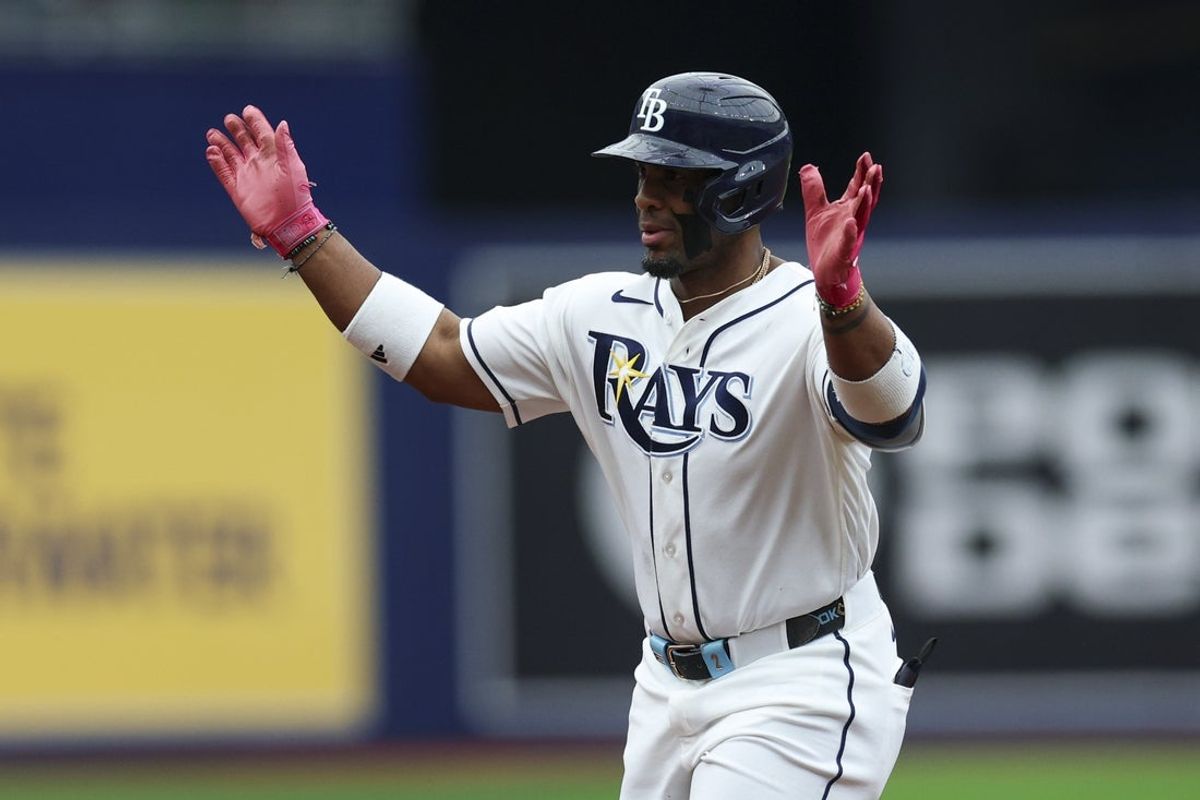 Apr 26, 2026; St. Petersburg, Florida, USA; Tampa Bay Rays designated hitter Yandy Díaz (2) reacts after hitting a two-run home run against the Minnesota Twins in the third inning at Tropicana Field. Mandatory Credit: Nathan Ray Seebeck-Imagn Images