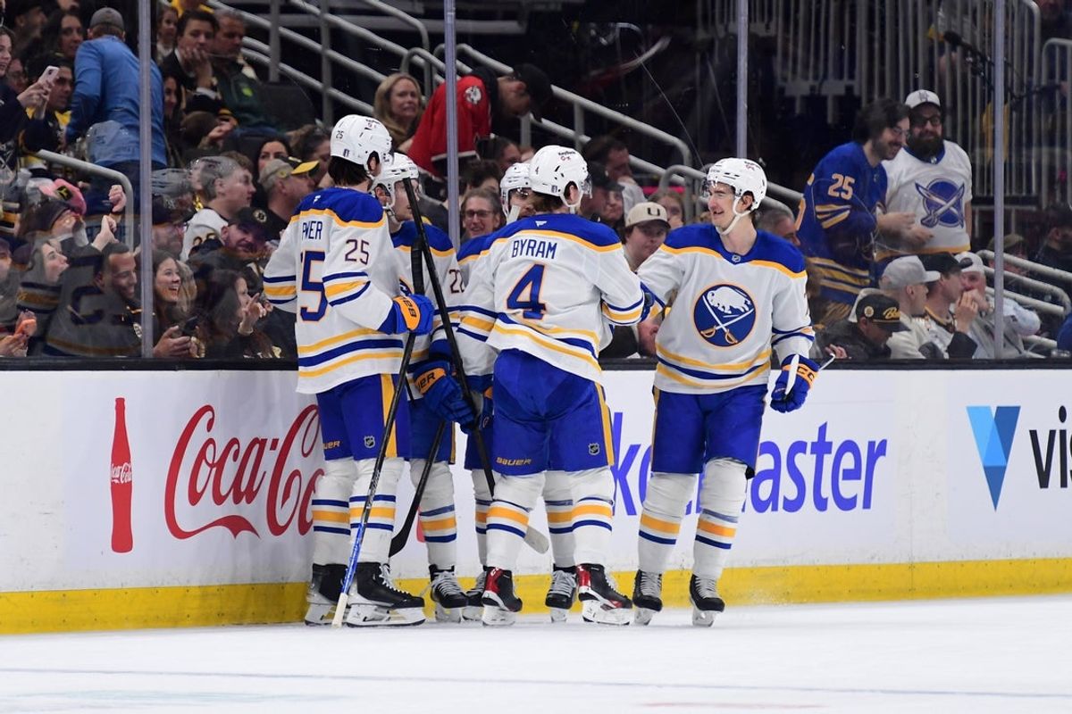 Apr 26, 2026; Boston, Massachusetts, USA; Buffalo Sabres defenseman Bowen Byram (4) celebrates his goal with his teammates during the first period in game four of the first round of the 2026 Stanley Cup Playoffs against the Boston Bruins at TD Garden. Mandatory Credit: Bob DeChiara-Imagn Images