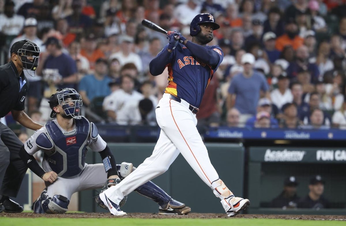 Apr 26, 2026; Houston, Texas, USA; Houston Astros designated hitter Yordan Alvarez (44) hits a double during the fifth inning against the New York Yankees at Daikin Park. Mandatory Credit: Troy Taormina-Imagn Images