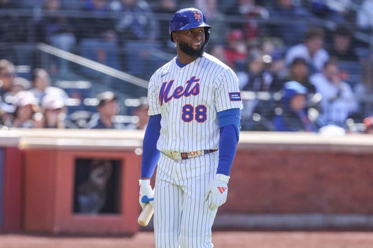 Apr 26, 2026; New York City, New York, USA;  New York Mets center fielder Luis Robert Jr. (88) reacts after popping out with the bases loaded in the eighth inning against the Colorado Rockies at Citi Field. Mandatory Credit: Wendell Cruz-Imagn Images