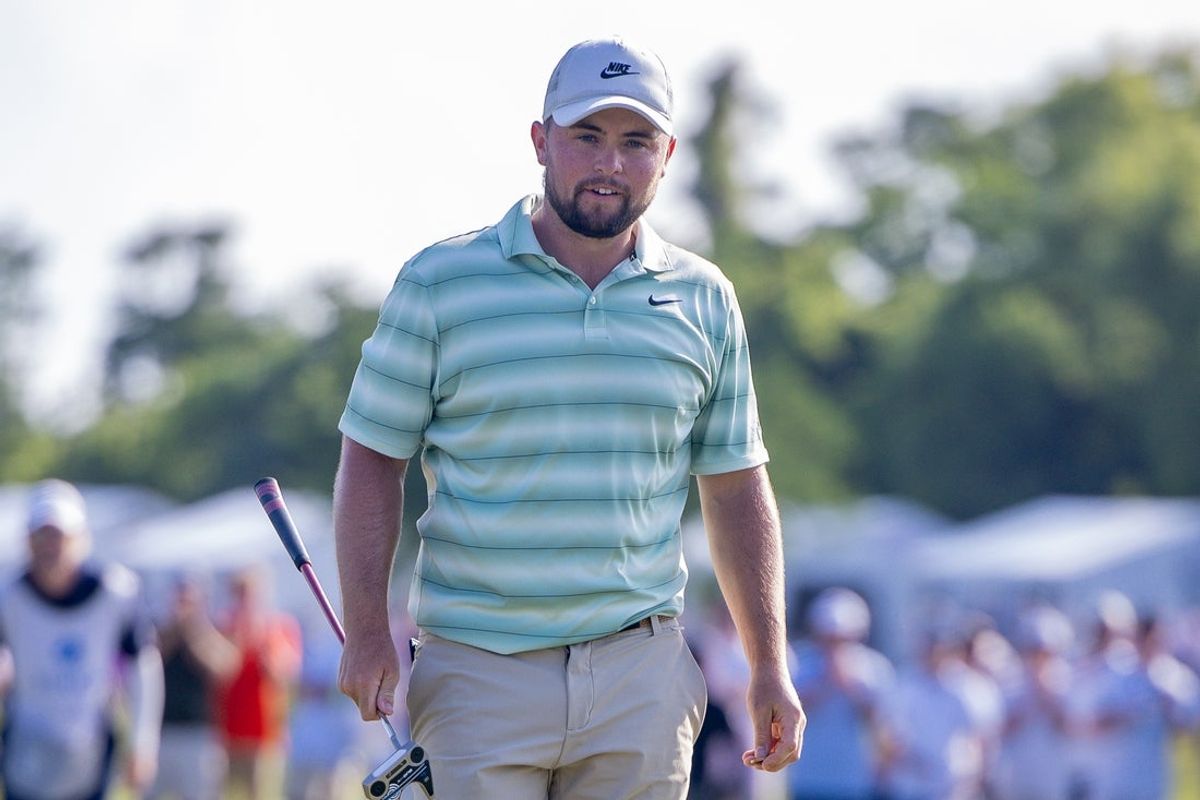 Apr 26, 2026; Avondale, Louisiana, USA;  Alex Fitzpatrick walks on the green on hole 18 during the final round of the Zurich Classic of New Orleans golf tournament. Mandatory Credit: Stephen Lew-Imagn Images