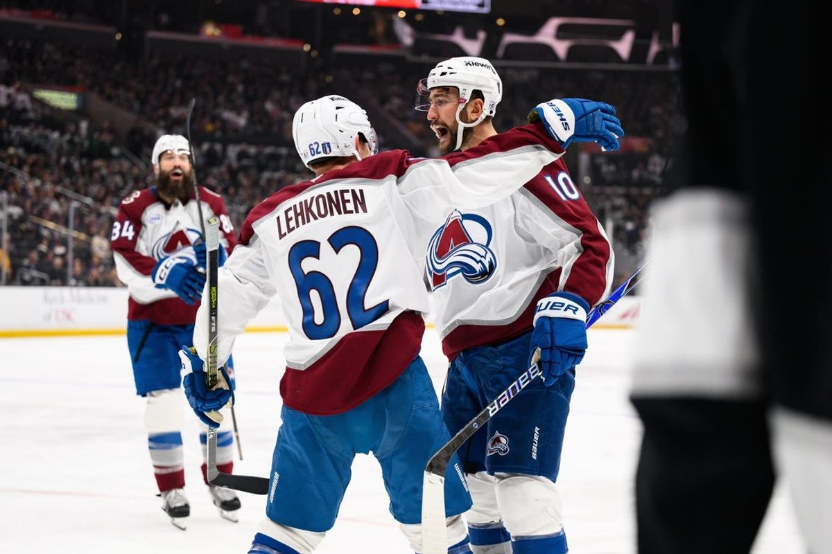 Apr 26, 2026; Los Angeles, California, USA; Colorado Avalanche center Nicolas Roy (10) is greeted by teammates after scoring during the third period in game four of the first round of the 2026 Stanley Cup Playoffs against the Los Angeles Kings at Crypto.com Arena. Mandatory Credit: William Liang-Imagn Images