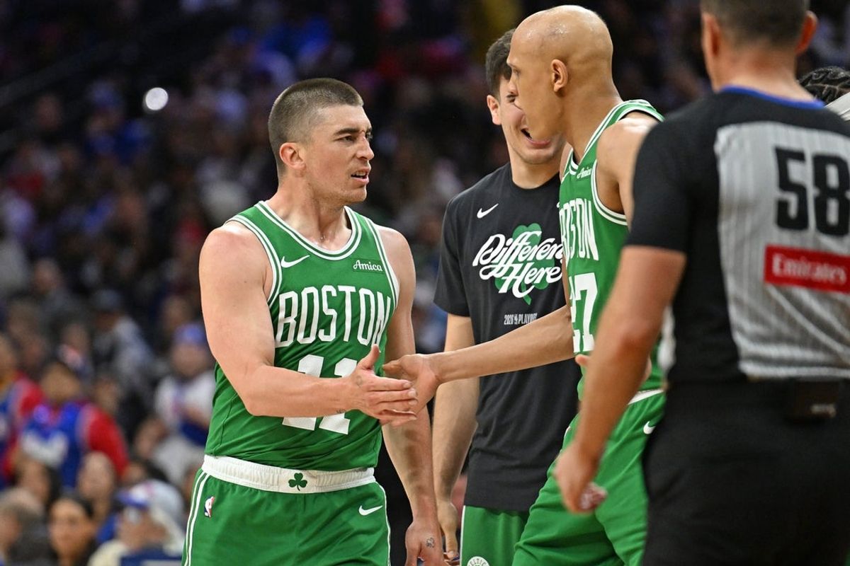 Apr 26, 2026; Philadelphia, Pennsylvania, USA; Boston Celtics guard Payton Pritchard (11) reacts after making a three point basket before the buzzer at the end of the first quarter against the Philadelphia 76ers at Xfinity Mobile Arena. Mandatory Credit: Eric Hartline-Imagn Images