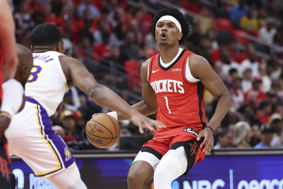 Apr 26, 2026; Houston, Texas, USA; Houston Rockets guard/forward Amen Thompson (1) dribbles the ball during the first quarter against the Los Angeles Lakers during game four of the first round of the 2026 NBA Playoffs at Toyota Center. Mandatory Credit: Troy Taormina-Imagn Images