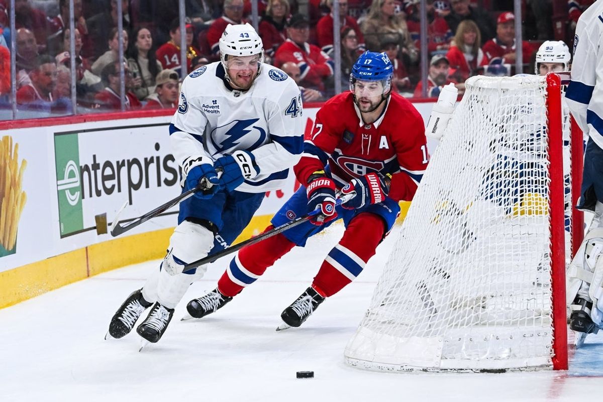 Apr 26, 2026; Montreal, Quebec, CAN; Tampa Bay Lightning defenseman Darren Raddysh (43) defends the puck against Montreal Canadiens right wing Josh Anderson (17) during the third period in game four of the first round of the 2026 Stanley Cup Playoffs at Bell Centre. Mandatory Credit: David Kirouac-Imagn Images
