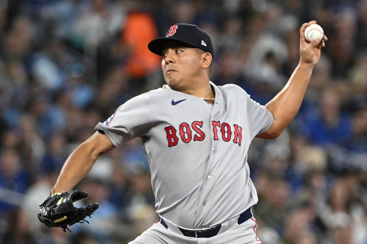 Apr 27, 2026; Toronto, Ontario, CAN;  Boston Red Sox starting pitcher Ranger Suarez (55) delivers a pitch against the Toronto Blue Jays in the second inning at Rogers Centre. Mandatory Credit: Dan Hamilton-Imagn Images