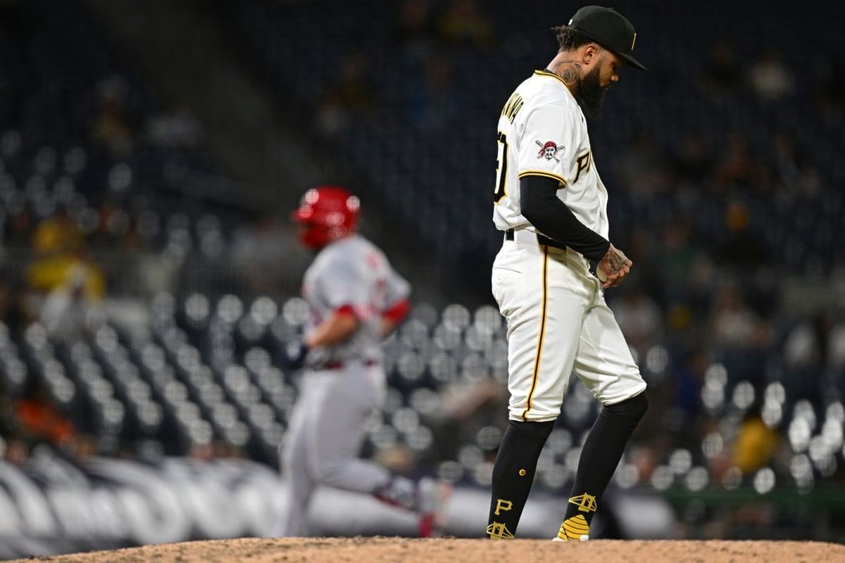Apr 27, 2026; Pittsburgh, Pennsylvania, USA; Pittsburgh Pirates relief pitcher Dennis Santana (60) waits for St. Louis Cardinals catcher Pedro Pages (43) to run the bases after hitting a solo home run during the ninth inning at PNC Park. Mandatory Credit: David Dermer-Imagn Images