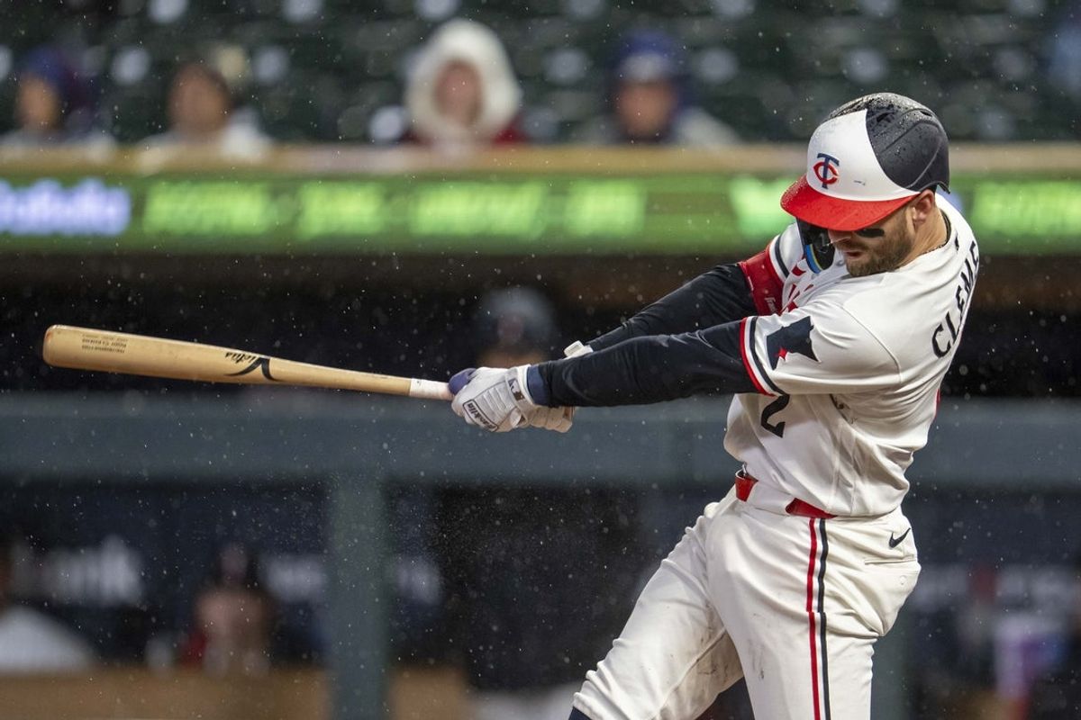 Apr 27, 2026; Minneapolis, Minnesota, USA; Minnesota Twins first baseman Kody Clemens (2) hits a single against the Seattle Mariners in the eighth inning at Target Field. Mandatory Credit: Jesse Johnson-Imagn Images