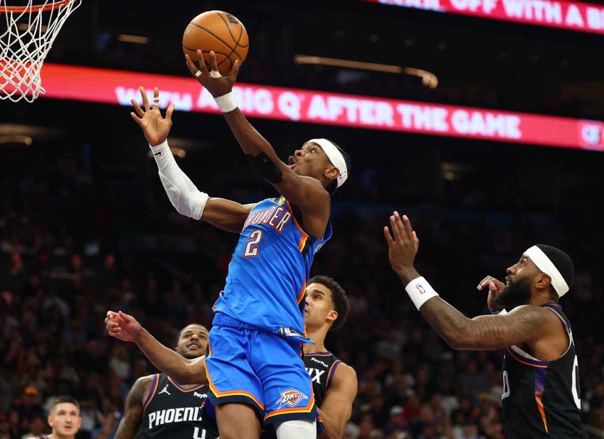 Apr 27, 2026; Phoenix, Arizona, USA; Oklahoma City Thunder guard Shai Gilgeous-Alexander (2) against the Phoenix Suns in the first half during game four of the first round of the 2026 NBA Playoffs at Mortgage Matchup Center. Mandatory Credit: Mark J. Rebilas-Imagn Images