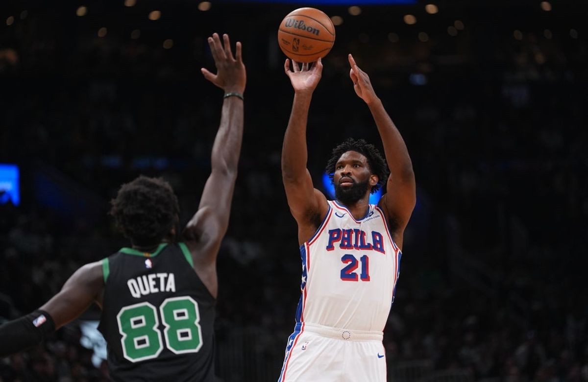 Apr 28, 2026; Boston, Massachusetts, USA; Philadelphia 76ers center Joel Embiid (21) shoots the ball against Boston Celtics center Neemias Queta (88)nin the first quarter during game five of the first round of the 2026 NBA Playoffs at TD Garden. Mandatory Credit: David Butler II-Imagn Images