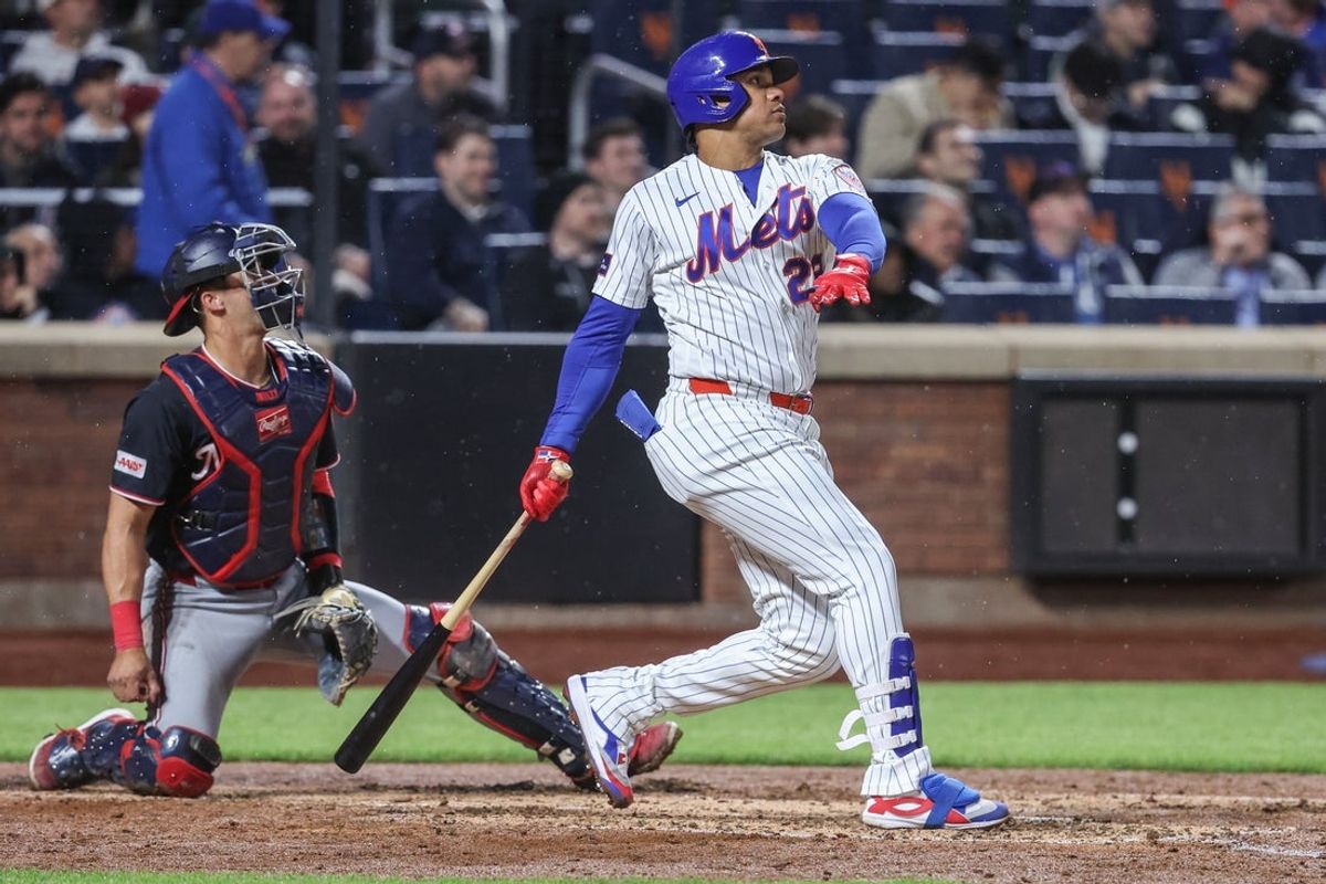 Apr 28, 2026; New York City, New York, USA;  New York Mets designated hitter Juan Soto (22) hits a two run home run in the fourth inning against the Washington Nationals at Citi Field. Mandatory Credit: Wendell Cruz-Imagn Images