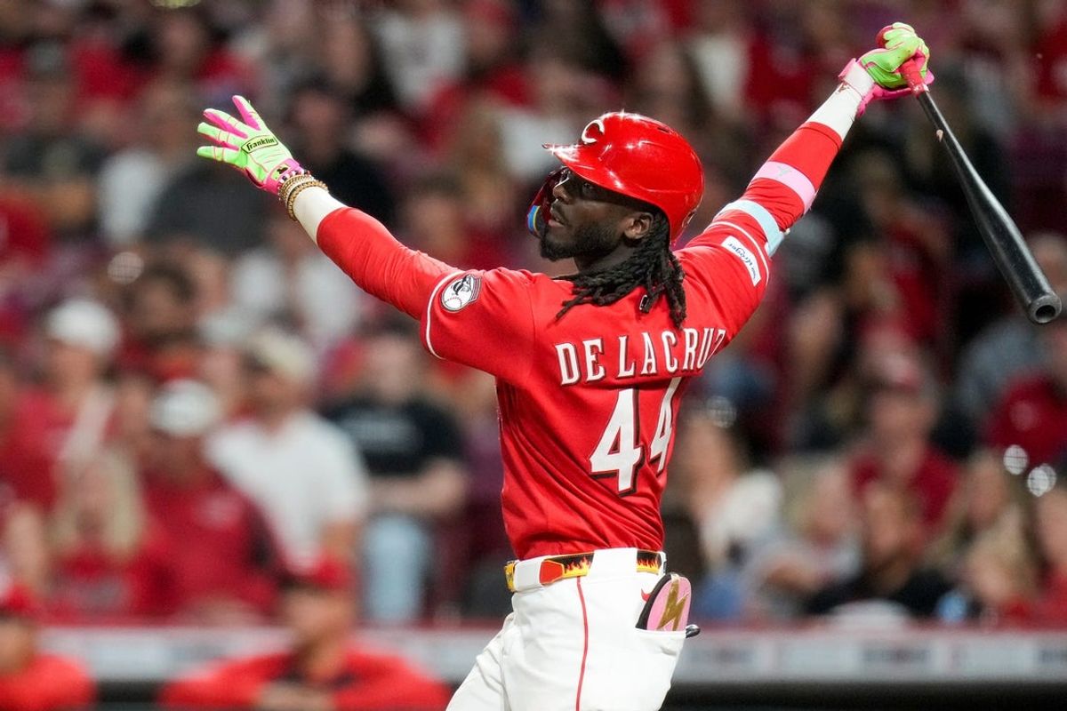 Cincinnati Reds shortstop Elly de la Cruz (44) follows through on a two-run home run in the eighth inning of the MLB National League game between the Cincinnati Reds and the Colorado Rockies at Great American Ball Park in downtown Cincinnati on Tuesday, April 28, 2026. The Reds won the opening game of the series, 7-2.