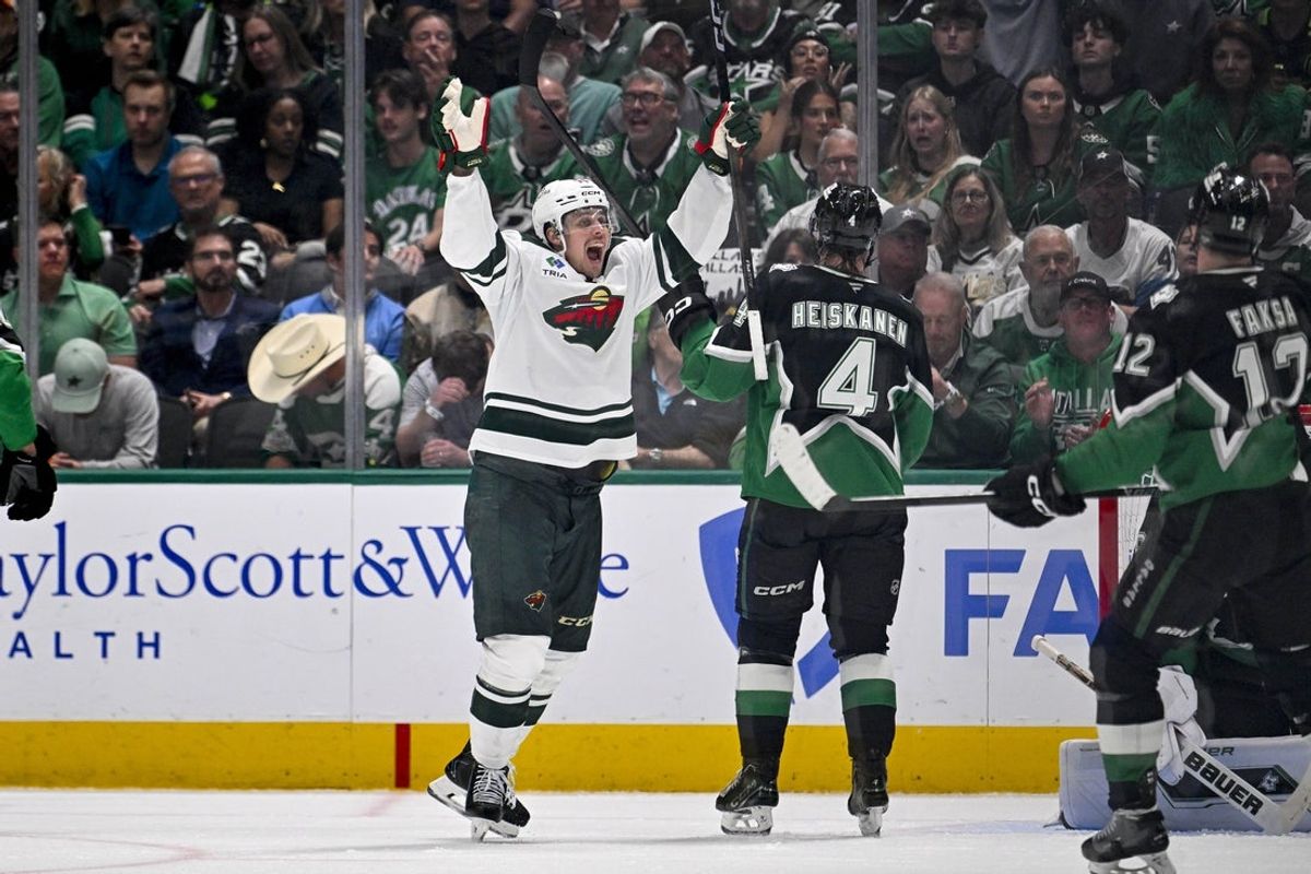 Apr 28, 2026; Dallas, Texas, USA; Minnesota Wild center Joel Eriksson Ek (14) celebrates a goal scored by left wing Matt Boldy (not pictured) against the Dallas Stars during the second period in game five of the first round of the 2026 Stanley Cup Playoffs at American Airlines Center. Mandatory Credit: Jerome Miron-Imagn Images