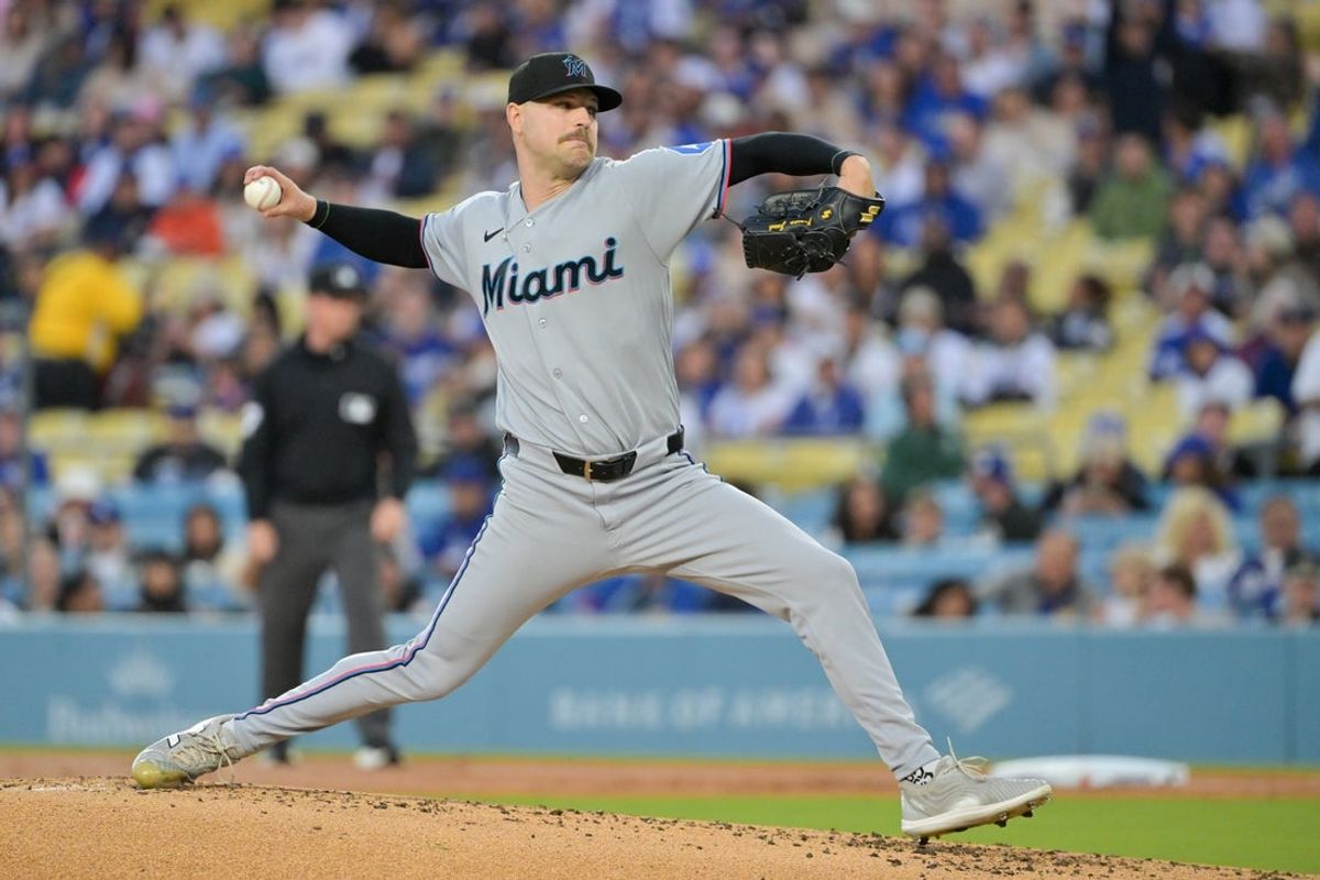 Apr 28, 2026; Los Angeles, California, USA; Miami Marlins pitcher Janson Junk (26) throws a pitch against the Los Angeles Dodgers during the first inning at Dodger Stadium. Mandatory Credit: Jayne Kamin-Oncea-Imagn Images