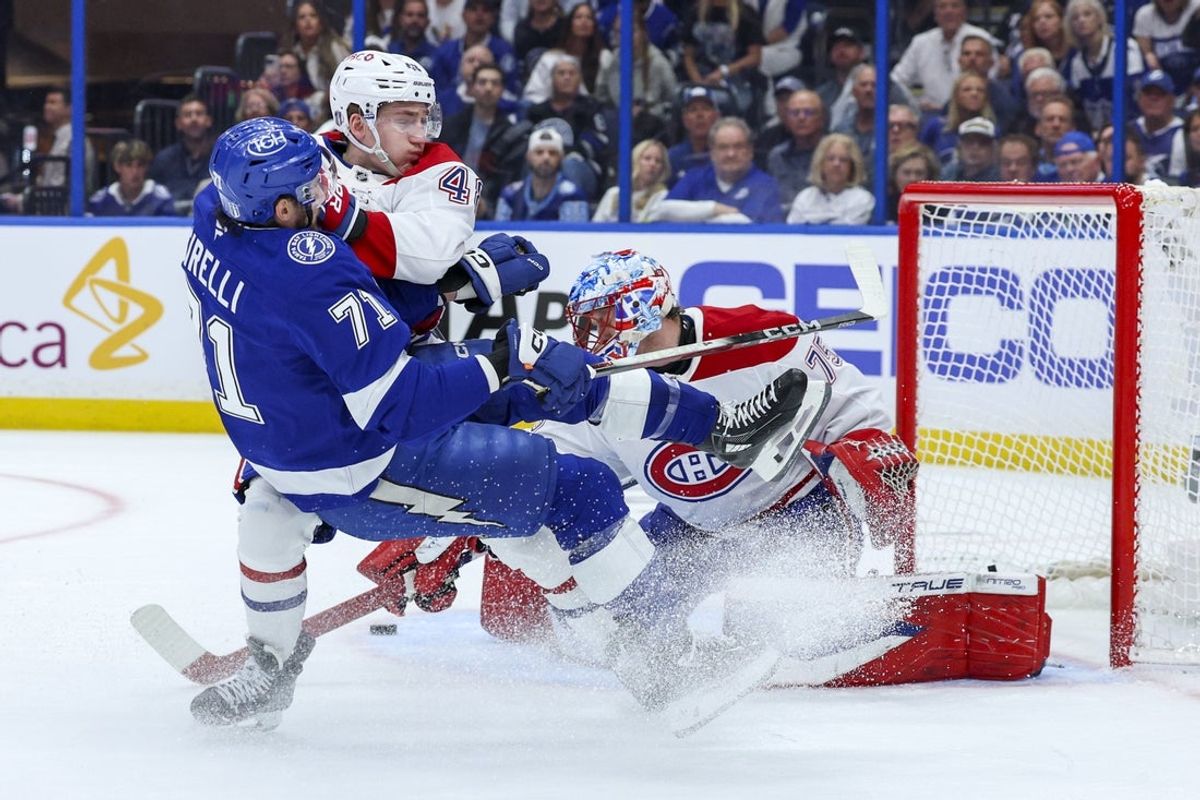 Apr 29, 2026; Tampa, Florida, USA; Montreal Canadiens defenseman Lane Hutson (48) blocks Tampa Bay Lightning center Anthony Cirelli (71) from shooting in the first period  during game five of the first round of the 2026 Stanley Cup Playoffs at Benchmark International Arena. Mandatory Credit: Nathan Ray Seebeck-Imagn Images