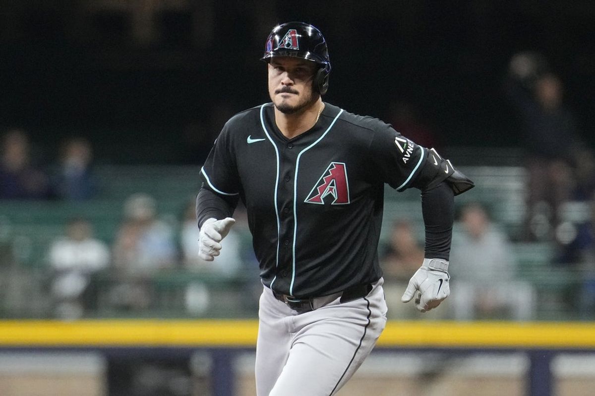Apr 29, 2026; Milwaukee, Wisconsin, USA; Arizona Diamondbacks third baseman Nolan Arenado (28) rounds the bases after hitting a home run against the Milwaukee Brewers in the fifth inning at American Family Field. Mandatory Credit: Michael McLoone-Imagn Images