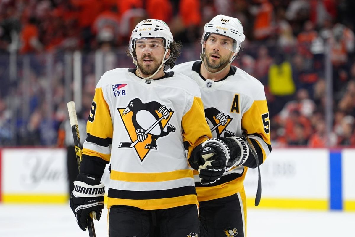 Apr 29, 2026; Philadelphia, Pennsylvania, USA; Pittsburgh Penguins defenseman Samuel Girard (49) reacts with defenseman Kris Letang (58) against the Philadelphia Flyers in the third period in game six of the first round of the 2026 Stanley Cup Playoffs at Xfinity Mobile Arena. Mandatory Credit: Kyle Ross-Imagn Images