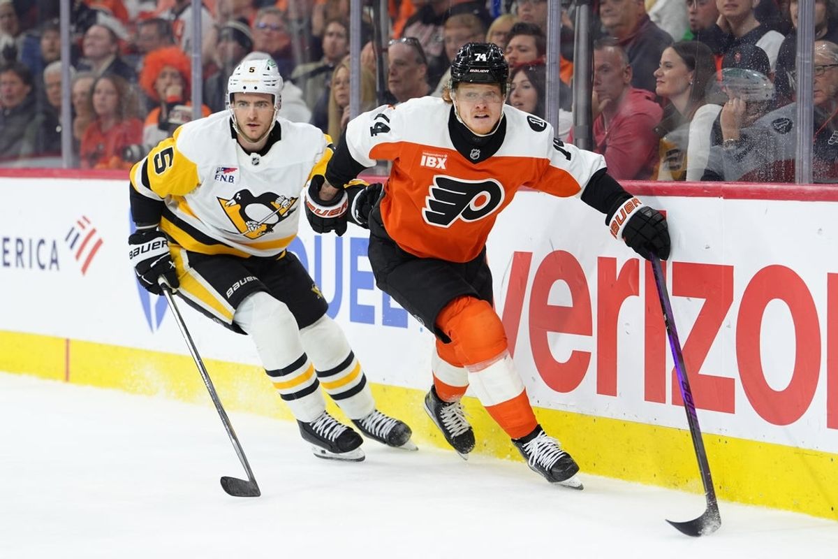 Apr 29, 2026; Philadelphia, Pennsylvania, USA; Philadelphia Flyers right wing Owen Tippett (74) skates against Pittsburgh Penguins defenseman Ryan Shea (5) in the third period in game six of the first round of the 2026 Stanley Cup Playoffs at Xfinity Mobile Arena. Mandatory Credit: Kyle Ross-Imagn Images