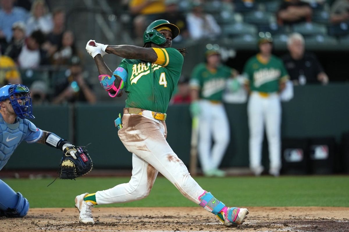 Apr 29, 2026; West Sacramento, California, USA; Athletics outfielder Lawrence Butler (4) hits a three-run home run against the Kansas City Royals in the fourth inning at Sutter Health Park. Mandatory Credit: Cary Edmondson-Imagn Images