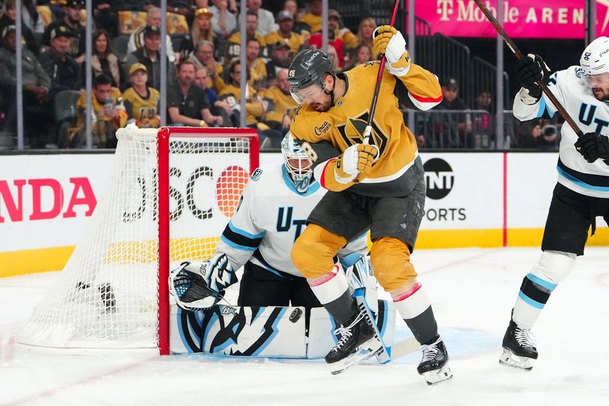 Apr 29, 2026; Las Vegas, Nevada, USA; Vegas Golden Knights center Tomas Hertl (48) looks for a loose puck while screening Utah Mammoth goaltender Karel Vejmelka (70) during the first period of game five of the first round of the 2026 Stanley Cup Playoffs at T-Mobile Arena. Mandatory Credit: Stephen R. Sylvanie-Imagn Images