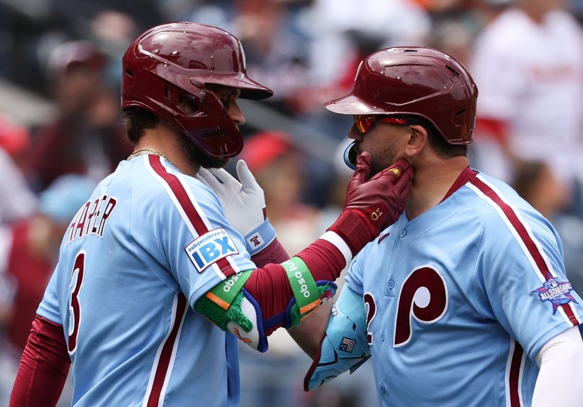 Apr 30, 2026; Philadelphia, Pennsylvania, USA; Philadelphia Phillies left fielder Kyle Schwarber (12) reacts with first baseman Bryce Harper (3) after hitting a home run during the first inning against the San Francisco Giants at Citizens Bank Park. Mandatory Credit: Bill Streicher-Imagn Images