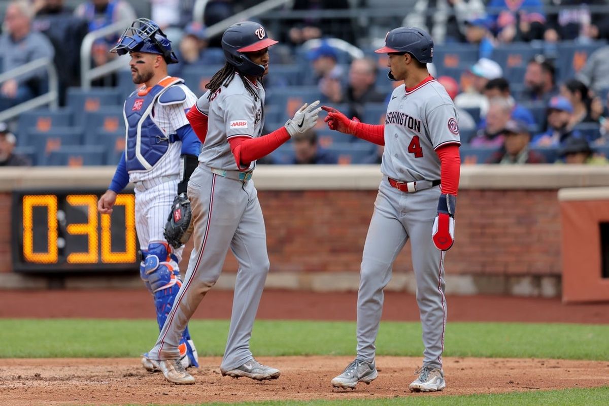 Apr 30, 2026; New York City, New York, USA; Washington Nationals shortstop CJ Abrams (5) celebrates his two run home run against the New York Mets with left fielder Daylen Lile (4) during the eighth inning at Citi Field. Mandatory Credit: Brad Penner-Imagn Images