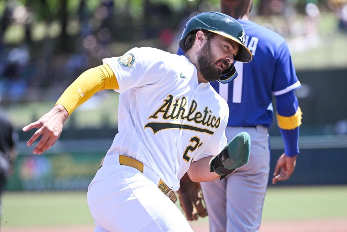 Apr 30, 2026; West Sacramento, California, USA; Athletics catcher Shea Langeliers (23) rounds third base on his way to score during the second inning of the game against the Kansas City Royals at Sutter Health Park. Mandatory Credit: Ed Szczepanski-Imagn Images