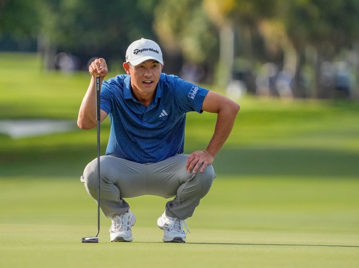 Apr 30, 2026; Miami, Florida, USA; Collin Morikawa lines up his birdie on the 17th hole during the first round of the Cadillac Championship golf tournament. Mandatory Credit: Jeff Romance-Imagn Images