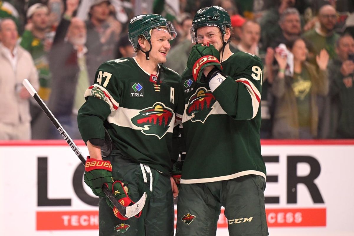Apr 30, 2026; Saint Paul, Minnesota, USA; Minnesota Wild forward Kirill Kaprizov (97) and forward Vladimir Tarasenko (91) celebrate a series win against the Dallas Stars after game six in the first round of the 2026 Stanley Cup Playoffs at Grand Casino Arena. Mandatory Credit: Nick Wosika-Imagn Images