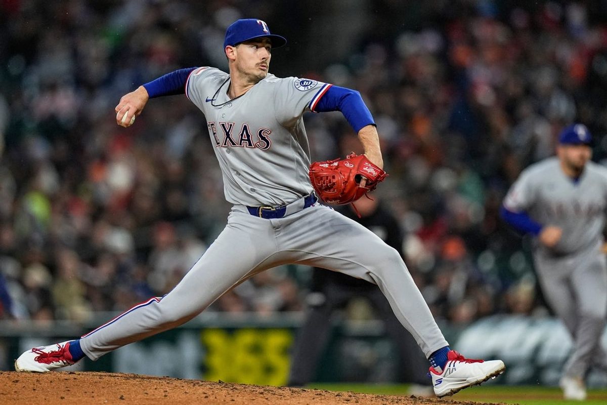 Texas Rangers pitcher Cole Winn (60) throws against Detroit Tigers during the fourth inning at Comerica Park in Detroit on Friday, May 1, 2026.