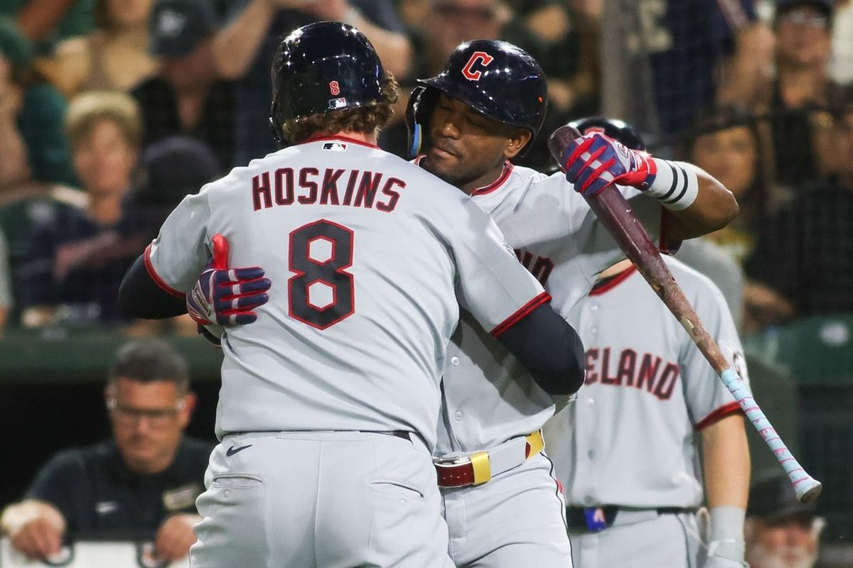 May 1, 2026; West Sacramento, California, USA; Cleveland Guardians designated hitter Rhys Hoskins (8) hugs Cleveland Guardians left fielder Angel Martinez (1) after hitting a solo home run during the seventh inning against the Athletics at Sutter Health Park. Mandatory Credit: Scott Marshall-Imagn Images