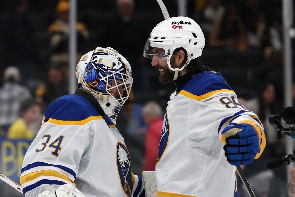 May 1, 2026; Boston, Massachusetts, USA; Buffalo Sabres right wing Alex Tuch (89) celebrates with goaltender Alex Lyon (34) after their 4-1 win over the Boston Bruins in game six of the first round of the 2026 Stanley Cup Playoffs at TD Garden. Mandatory Credit: Winslow Townson-Imagn Images