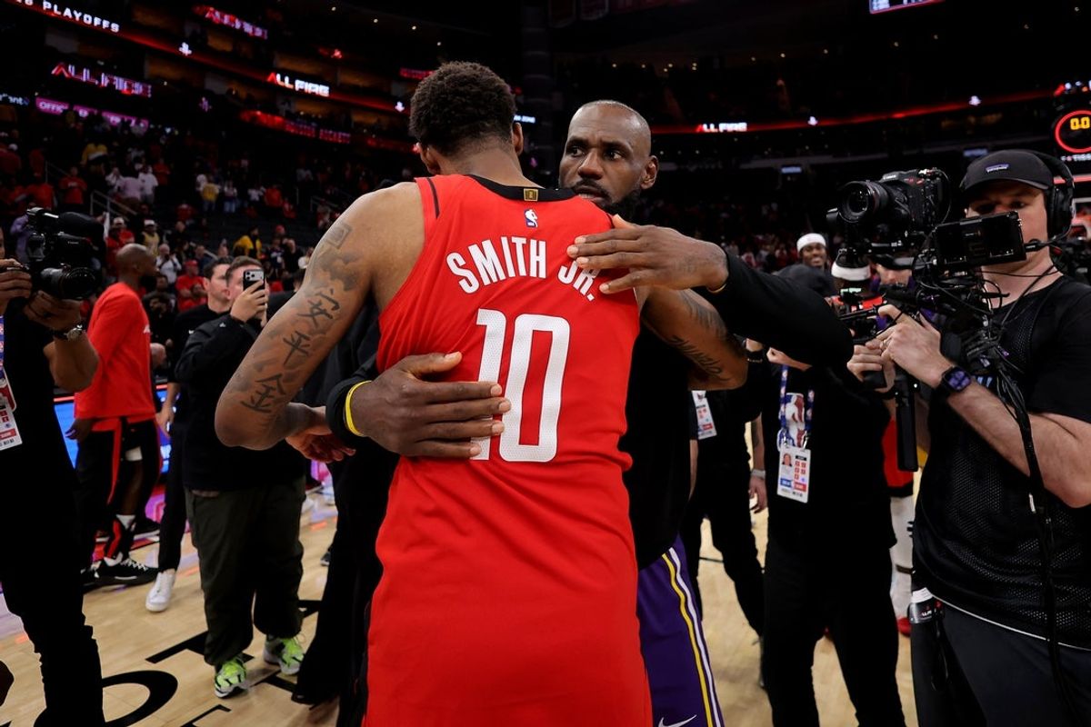 May 1, 2026; Houston, Texas, USA; Los Angeles Lakers forward Lebron James (23) greets Houston Rockets forward Jabari Smith Jr. (10) following game six of the first round of the 2026 NBA Playoffs at Toyota Center. Mandatory Credit: Erik Williams-Imagn Images