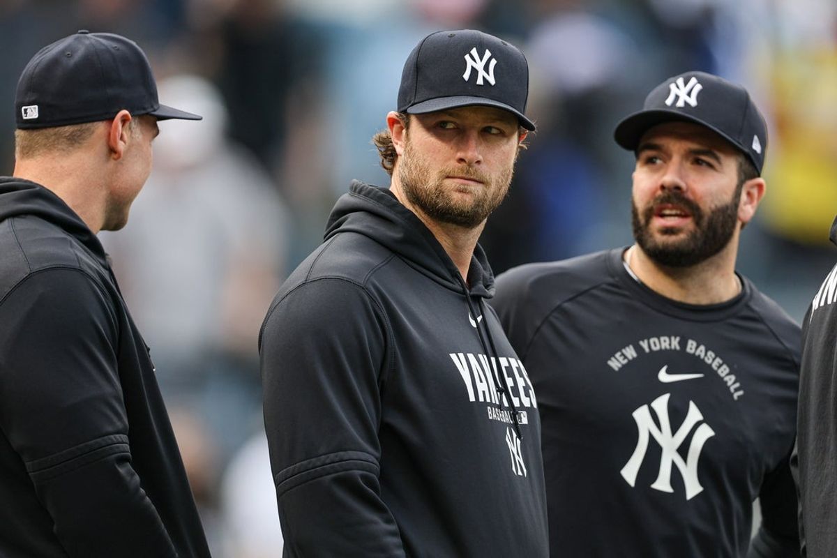 May 2, 2026; Bronx, New York, USA; New York Yankees pitcher Gerrit Cole, center, on the field after the game against the Baltimore Orioles at Yankee Stadium. Mandatory Credit: Vincent Carchietta-Imagn Images