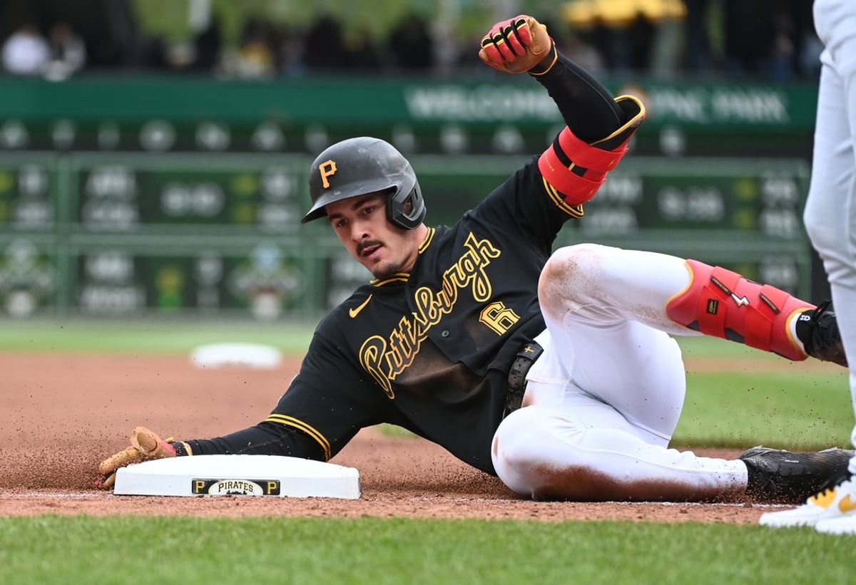 May 2, 2026; Pittsburgh, Pennsylvania, USA;  Pittsburgh Pirates shortstop Konnor Griffin slides into third base for a triple against the Cincinnati Reds during the fourth inning at PNC Park. Mandatory Credit: Philip G. Pavely-Imagn Images