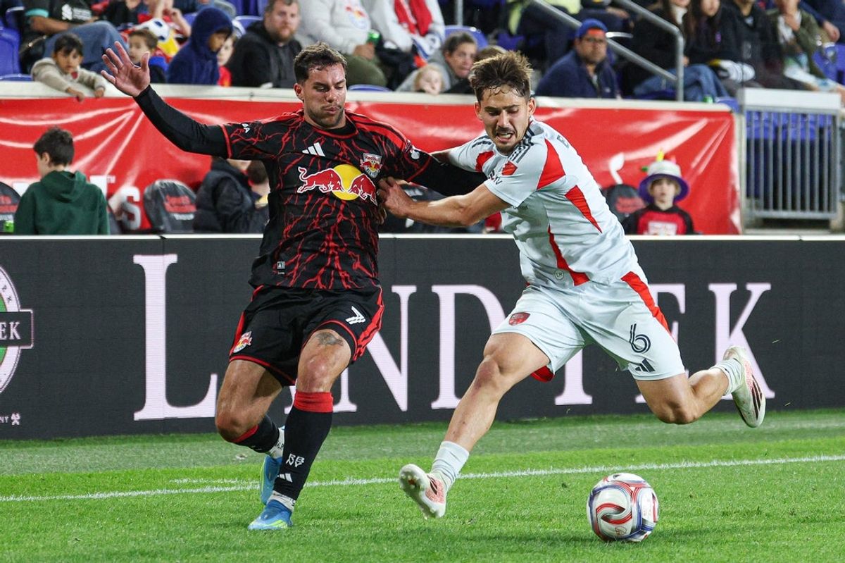 May 2, 2026; Harrison, New Jersey, USA; Red Bull New York forward Cade Cowell (7) and FC Dallas midfielder Ran Binyamin (6) battle for the ball during the first half at Sports Illustrated Stadium. Mandatory Credit: Vincent Carchietta-Imagn Images