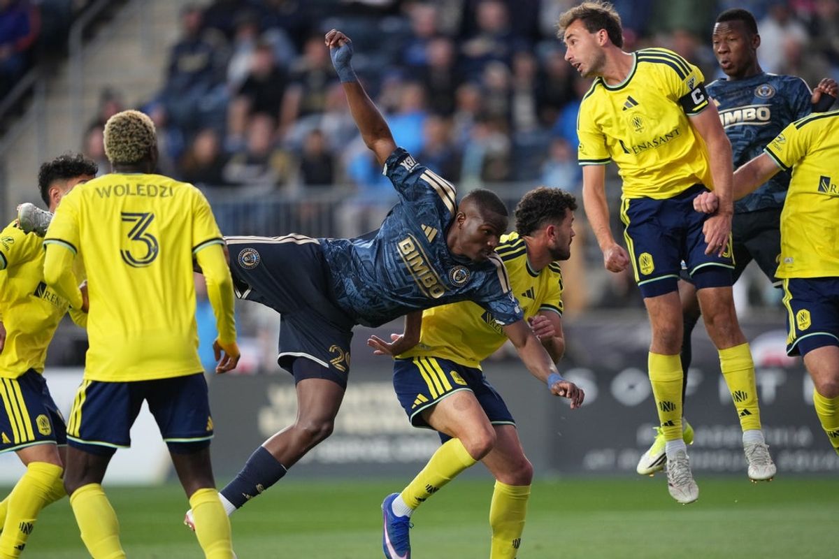 May 2, 2026; Chester, Pennsylvania, USA; Philadelphia Union defender Olwethu Makhanya (29) dives against Nashville SC midfielder Patrick Yazbek (8) in the first half at Subaru Park. Mandatory Credit: Kyle Ross-Imagn Images
