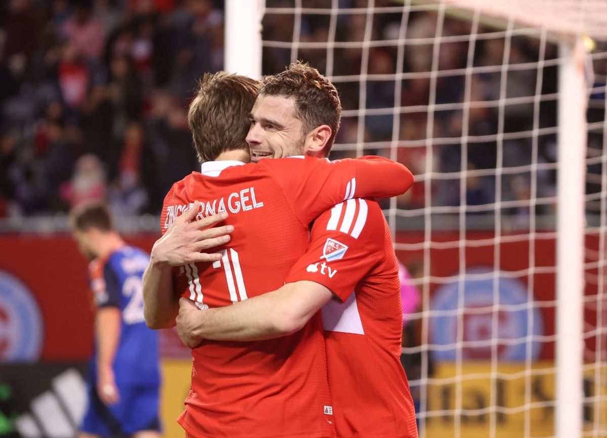 May 2, 2026; Chicago, Illinois, USA; Chicago Fire FC midfielder Philip Zinckernagel (11) and forward Hugo Cuypers (9) celebrate a goal during the first half against the FC Cincinnati at Soldier Field. Mandatory Credit: Talia Sprague-Imagn Images