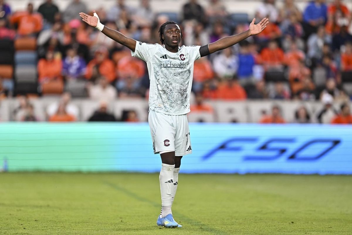 May 2, 2026; Houston, Texas, USA; Colorado Rapids forward Darren Yapi (77) motions during the first half against the Houston Dynamo at Shell Energy Stadium. Mandatory Credit: Maria Lysaker-Imagn Images