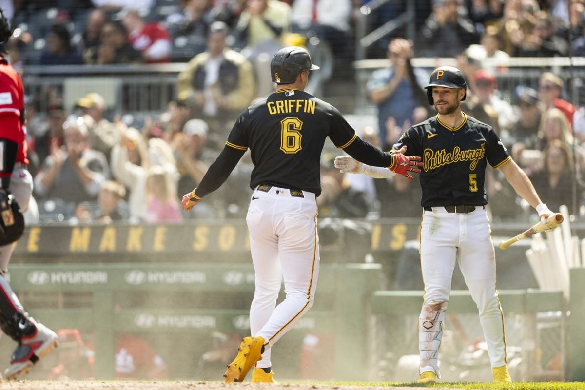 May 3, 2026; Pittsburgh, Pennsylvania, USA;  Pittsburgh Pirates short stop Konnor Griffin (6) is congratulated by second baseman Brandon Lowe (5) for his score against the Cincinnati Reds during the eighth inning at PNC Park. Mandatory Credit: Scott Galvin-Imagn Images