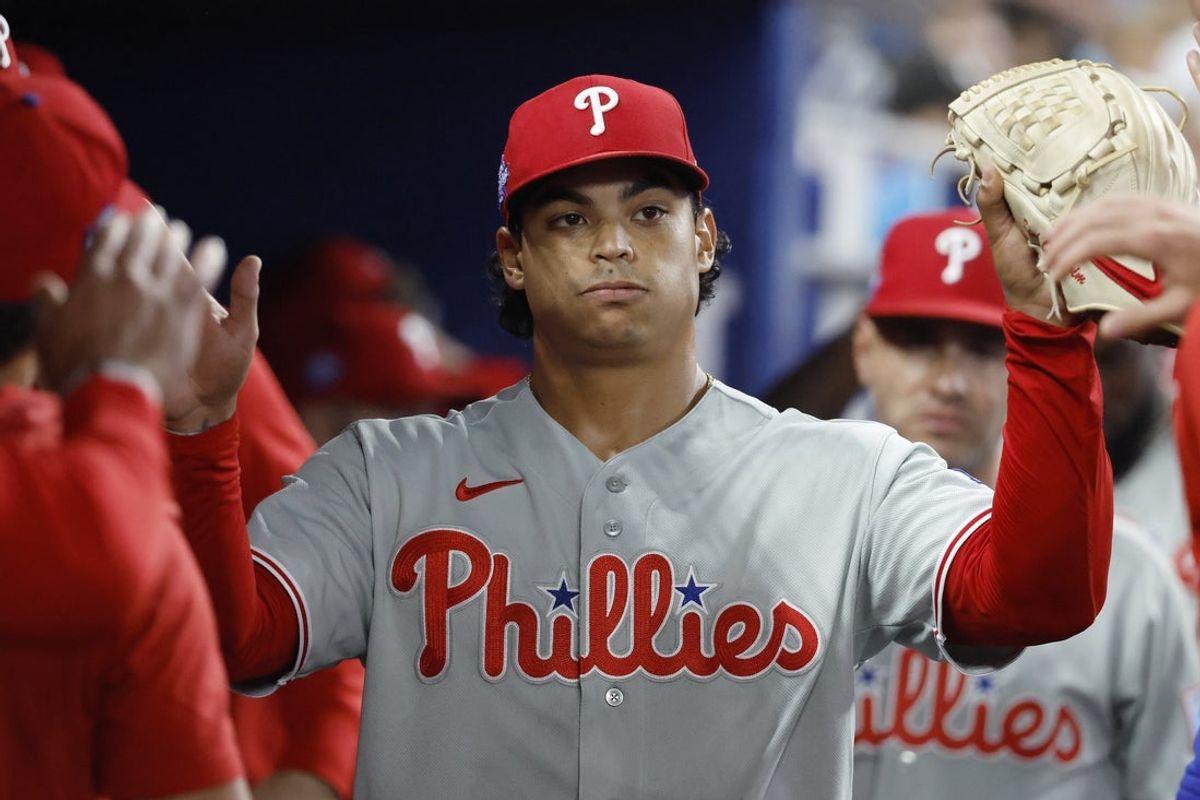 May 3, 2026; Miami, Florida, USA;  Philadelphia Phillies starting pitcher Jesus Luzardo (44) is congratulated by teammates in the dugout against the Miami Marlins during the seventh inning at loanDepot Park. Mandatory Credit: Rhona Wise-Imagn Images