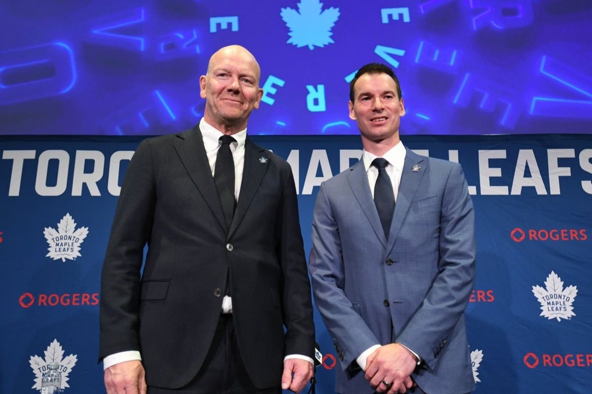 May 4, 2026; Toronto, Ontario, CANADA;  Toronto Maple Leafs new senior executive advisor Mats Sundin (l) and general manager John Chayka pose for picture after an introductory news conference at Real Sports Bar and Grill. Mandatory Credit: Dan Hamilton-Imagn Images