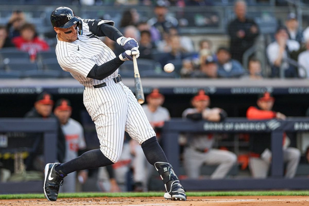 May 4, 2026; Bronx, New York, USA; New York Yankees right fielder Aaron Judge (99) hits a two run home run during the first inning against the Baltimore Orioles at Yankee Stadium. Mandatory Credit: Vincent Carchietta-Imagn Images
