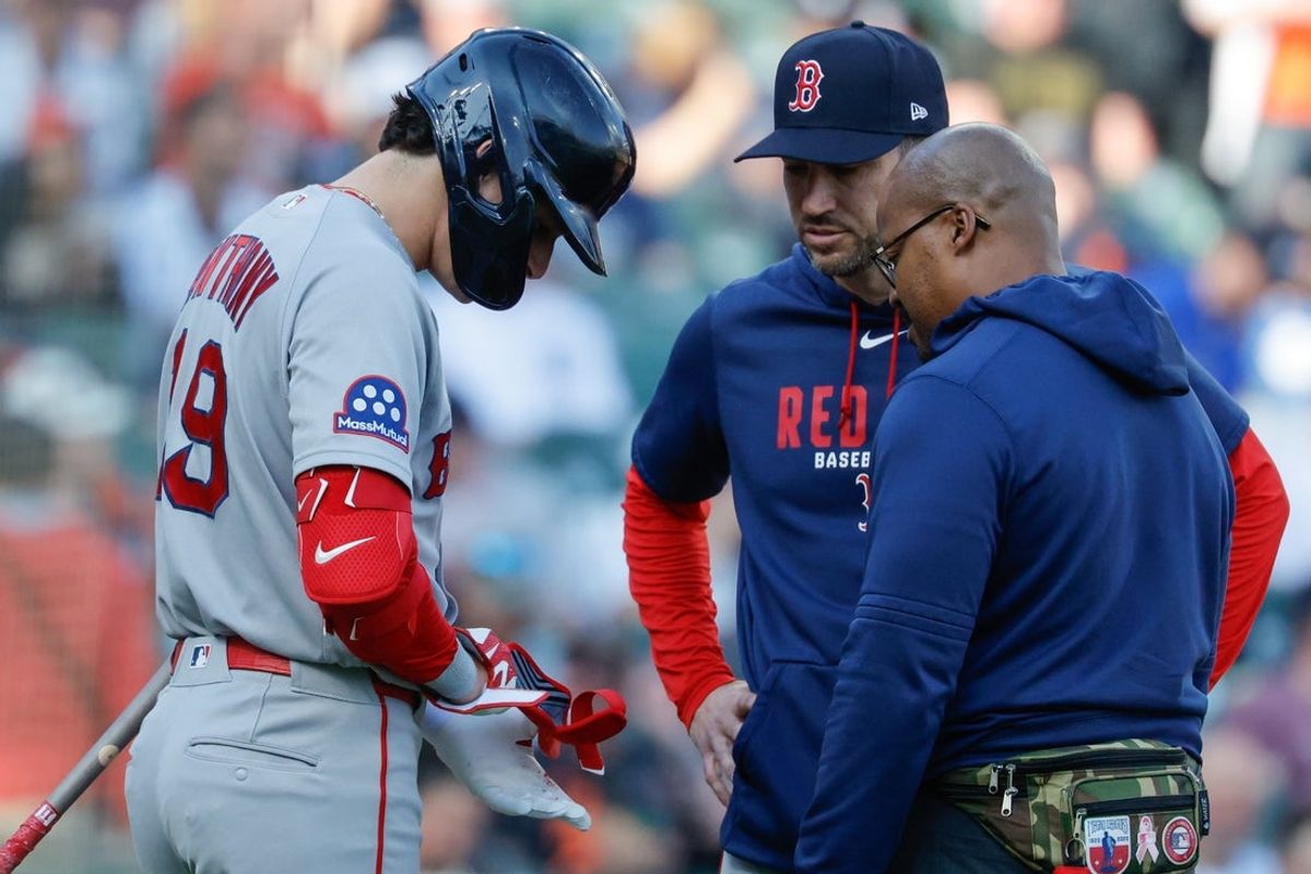 May 4, 2026; Detroit, Michigan, USA;  Boston Red Sox left fielder Roman Anthony (19) is checked on by interim manager Chad Tracy (17) and the trainer in the first inning against the Detroit Tigers at Comerica Park. Mandatory Credit: Rick Osentoski-Imagn Images